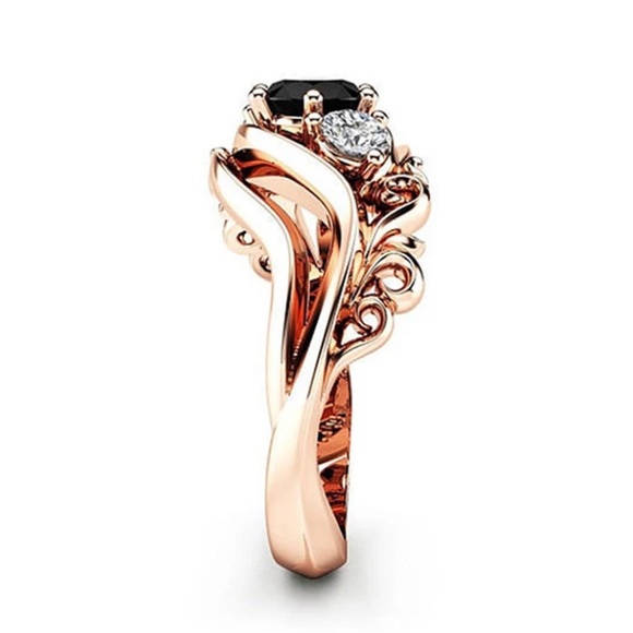 Unique Black Stone Prong Setting with a Twist Band in Rose Gold - Picture 2 of 5